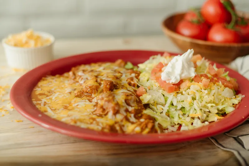 Combination #7: burrito verde, bean tostada, and cheese enchilada at Su Casa